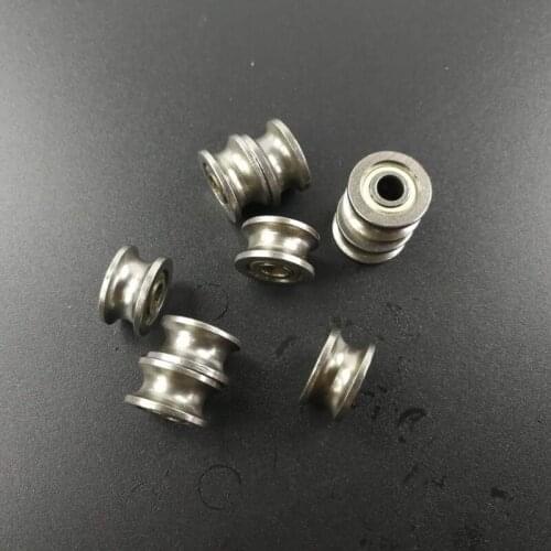 Phone bracket sliding U-groove beaing roller/wheel/ bearing bore 4mm ,diameter 13mm, thickness 7mm.10pcs/lot