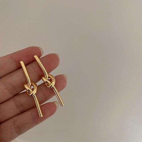 U-Magical Statement Gold Color Huggie Knotted Dangle Earrings for Women Long Metallic Hollow Earrings Jewellery Accessories