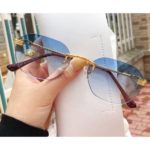 2021 Mens Fashion Gold Metal Rimless Sunglasses Retro Steampunk Womens Pilot Simple Funny Street Shooting Gradient Eyewears