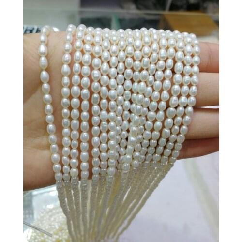 One Strands 4-5mm bright white pearl oval rice real natural freshwater pearl loose beads 35cm / 14.5inch DIY