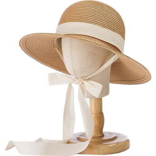 2021 Korean spring and summer new dome wide brim childrens sunshade straw hat outdoor travel holiday sunscreen straw hat strap