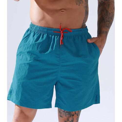 Mens Summer Board Shorts Solid Color Beach Shorts Drawstring Sportswear Bottoms Man Training Gyms Fitness Jogger With Pocket