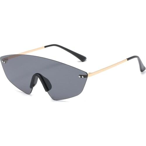 New one-piece rimless sunglasses trend men and women retro street shooting sunglasses gradient color rice nail glasses women