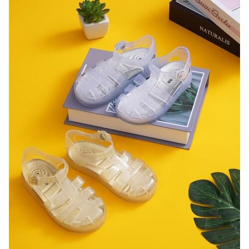 MINI DD Baby sandals 2021 summer new transparent PVC jelly shoes Princess Baotou childrens Roman beach soft candy shoes DD007