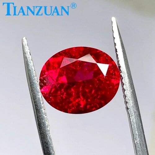 Artificial ruby dark red color oval shape natural cut created stone with inclusions vs si clarity loose stone