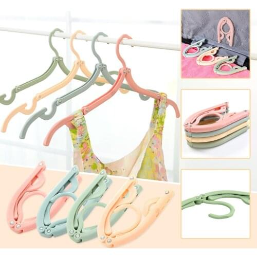 4pcs Plastic Travel Hanger Folding Hanger Hang Multifunctional Telescopic Clothes Portable Travel Hanger Household Clothes Clip
