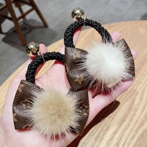New woman Luxurious fur hair accessories Real Leather printed bow Mink hair ball Hair ring Elastic hair loop