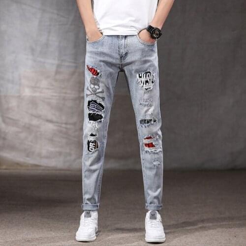 Spring autumn 2020 Fashion brand light-colored ripped jeans mens feet Korean elastic skull embroidery wild beggar pencil pants