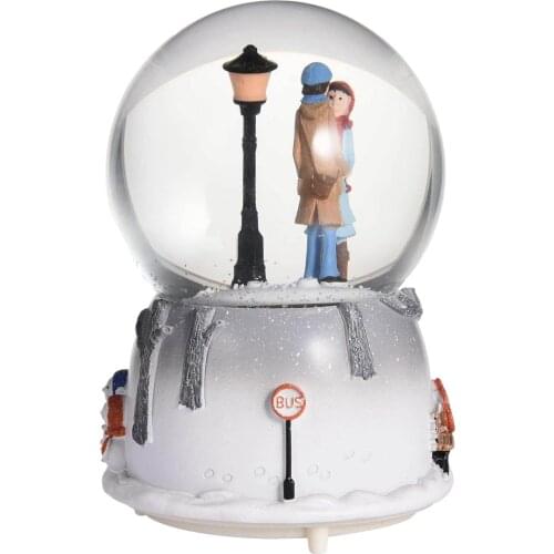 High-quality Castle In The Sky Music Crystal Ball Automatic Snowflake Spray Beautiful Couple Snow Globe For Gifts