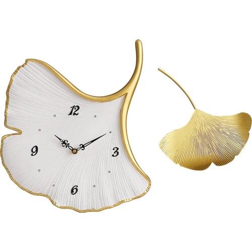 Creative personality ginkgo leaf hanging ornament light luxury metal model room decoration three dimensional bedroom wall clock