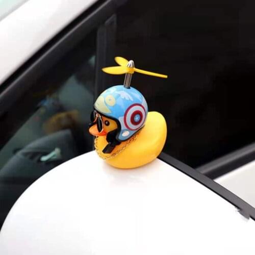 1 piece of cute little yellow duck car ornaments car bamboo dragonfly broken wind duck doll car interior