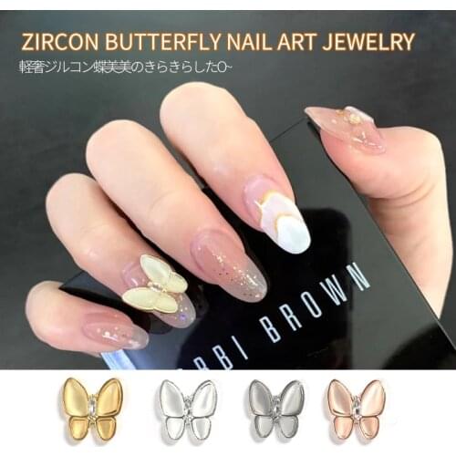 1 piece of nail art alloy zircon metal Cats eye stone butterfly luxury pearl DIY rhinestone nail art accessories Decoration Hot