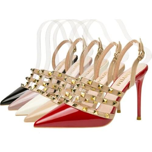 New 10CM PUMPS Sexy Pointed Roman High Heels Nightclub Rivets Female Sandals Stiletto Back Empty High-Heeled Shoes Womens Shoes