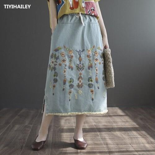 TIYIHAILEY Free Shipping Tassels Cotton Denim Long Mid-calf Skirts For Women Summer Elastic Waist A-line Embroidery Holes Skirts