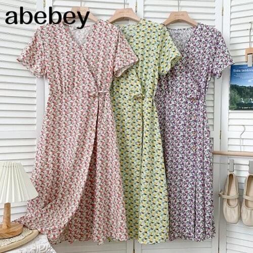 Fashion V-neck short sleeve Dress high waist bandage waist irregular single breasted Floral Dress 2021 New Summer
