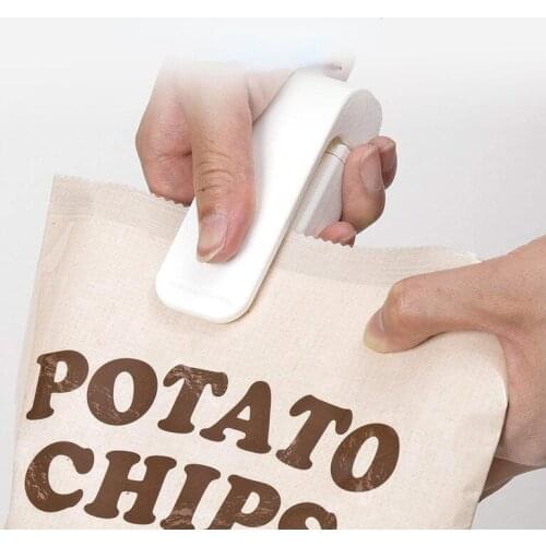 Portable Mini Sealing Machine Household Plastic Bag Sealing Device Snack Hand Pressure Electric Sealing Device Food Preservation