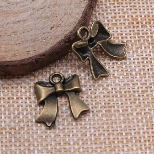 Free shipping 54pcs 17mm antique bronze Bow charms diy retro jewelry fit Earring keychain hair card pendant accessories