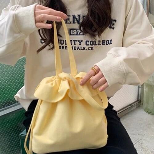 2021 New Original Design Hand Bag Hand Carrying Milk Yellow Bag Mini Drawstring Small Bag Cute and Unreasonable