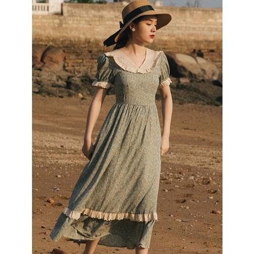 Make floral stitching hubble-bubble sleeve dress price shall not be less than RMB