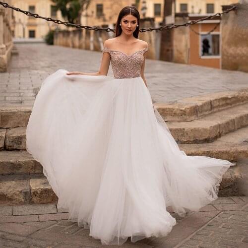 Sparkling Crystals Wedding Dress Sexy Sheer Scoop Neck Beading Tulle A Line Sweep Train Bridal Gown Robe De Mariee