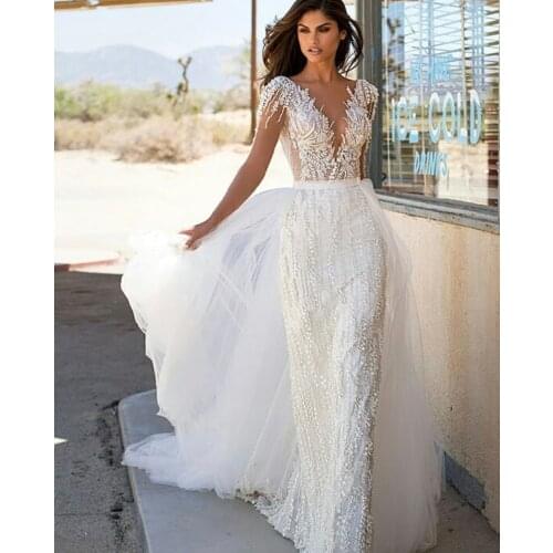 Wedding Dress A-Line V-Neck Cap Sleeve Lace Appliques Sequined Beads Backless Floor Length Sweep Train Elegant Bride Gown 2021