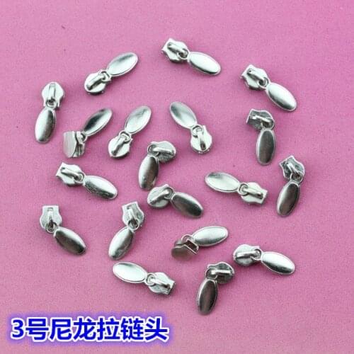 Free shipping 100pcs/lot 3# nylon zipper head thick metal zipper head duvet cover cushion pillow case zipper head accessories