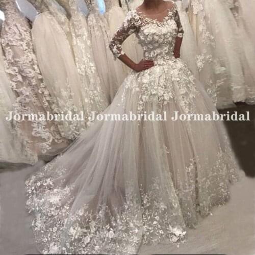 Glamorous 3D Appliques Wedding Dress With Three Quarter Sleeves Glitter Tulle See Through Buttons Back Ball Gown Bridal Dresses