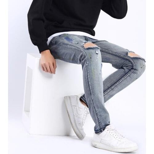 Tight graffiti stretch jeans man shredded jeans