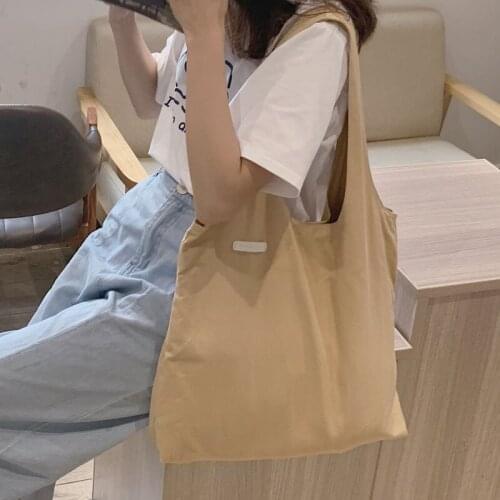 Korea ins Ulzzang casual large-capacity solid color female chic vintage fashion new letter canvas Lady shoulder bags