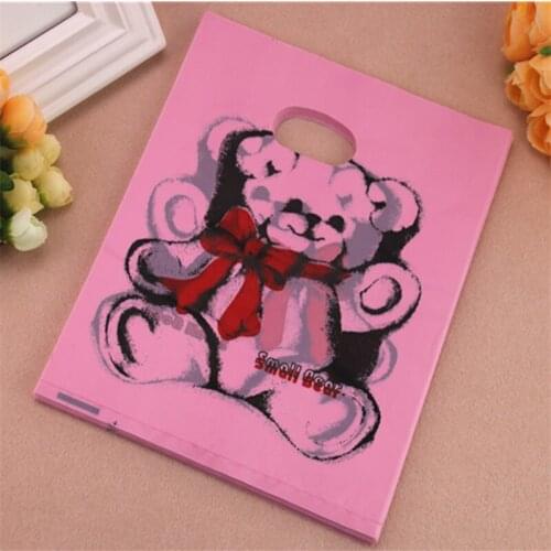 2016 New Design Wholesale 100pcs/lot 20*25cm Dark Pink Lovely Bear Plastic Bags With Handles Medium Clothing Packaging Bags