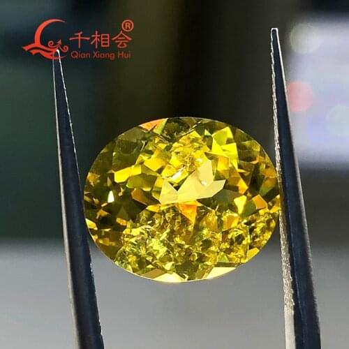 Yellow color oval shape artificial sapphire including minor cracks and inclusions corundum loose gem stone