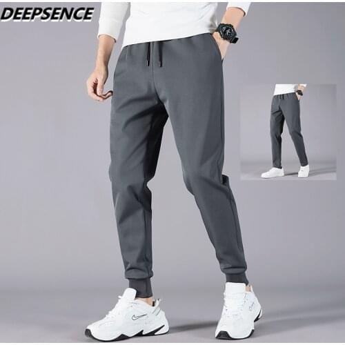Men Full Pants 2021 Autumn New Slim Microelasticity Casual Pants Men Trend Streetwear Wild Solid Color Sports Pencil Pants Men