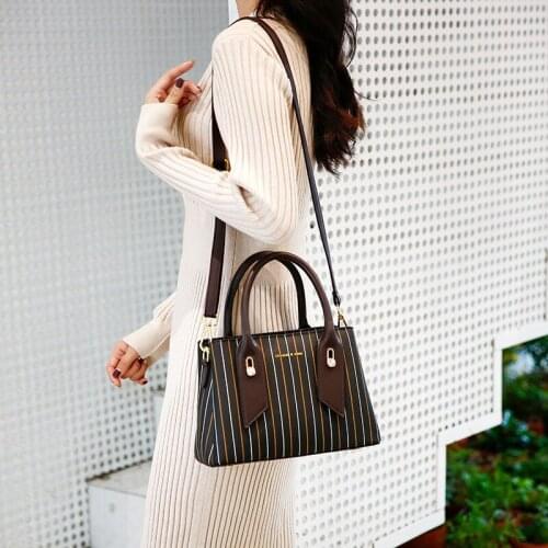 2020 autumn/winter new womens bag luxury high-quality brand casual striped one-shoulder stiletto handbag