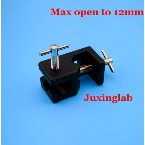 Laboratory Universal BossHead clamp multipurpose use for round or rectangular rods up to 12mm . tcross and parallel arrangements