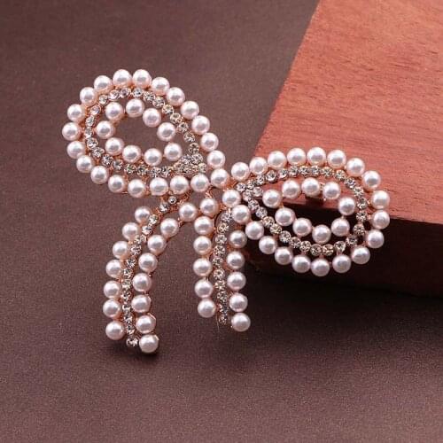Women Pearl rosette Brooches Gold bow-knot Fashion jewelry beauty lady Crystal pins hot sale wedding party Gift button new year