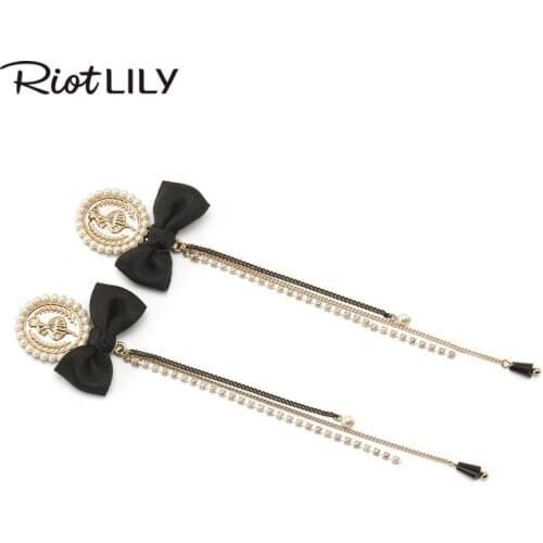 British coin long bow earrings niche earrings high sense