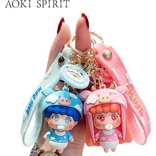 Cartoon Baby in Cow Pajamas Doll Keychain Cute Male and Female Couple Pendant PVC 3D Mobile Phone Backpack Car Accessories Gift