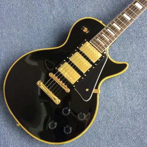 Free delivery, black electric guitar, Rosewood fingerboard, yellow binding with gold hardware