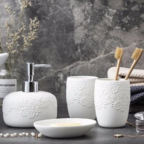 Creative Bathroom Four-piece White Embossed Pattern Bathroom Accessorie Lotion Bottle Soap Dish Mouthwash Cup Tray with Gift Box