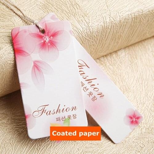 Custom Grade A Coated paper tags clothing print Swing hang tag dress 3000 pcs/single design