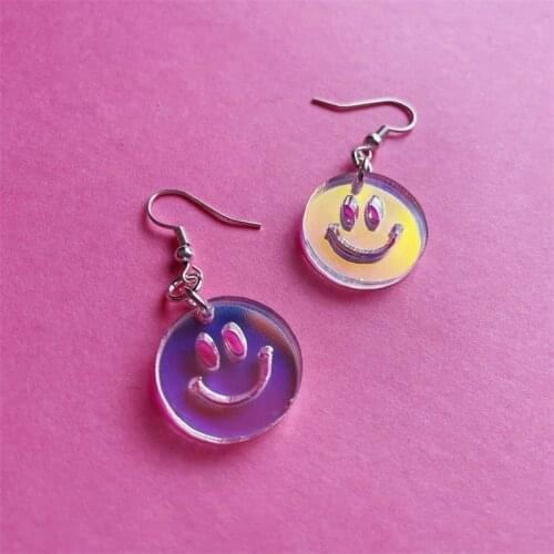 HAPPY DAZE- iridescent laser cut smiley face earrings
