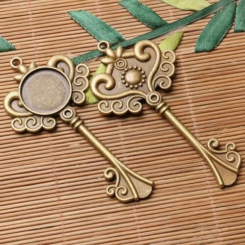 Antiqued bronze and dark silver color floral key charms round cabochon setting in 20mm 4pcs