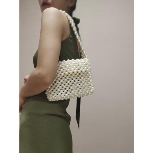 Restoring ancient ways is the great pearl wide straps clamshell woven beaded shoulder bag handbag