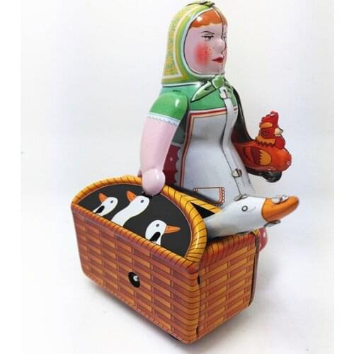 [Funny] [New] Classic collection Retro Clockwork Wind up Metal Walking Tin farmer robot woman with the goose Mechanical toy gift