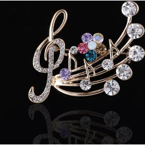 Lady`s music note gloden brooch with rhinestone