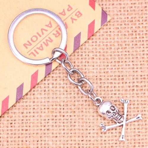 20pcs New Fashion Keychain 24x19mm skull skeleton bone Pendants DIY Men Jewelry Car Key Chain Ring Holder Souvenir For Gift