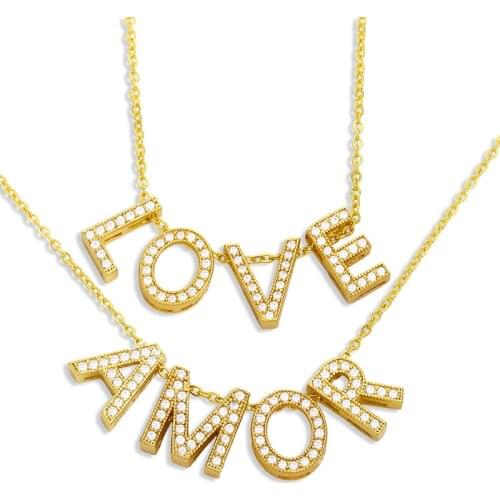 FLOLA White Stone Amor Love Letter Necklace For Women Gold Plated Cubic Zirconia Pendant Necklace Wholesale Jewelry Gifts nkeu66