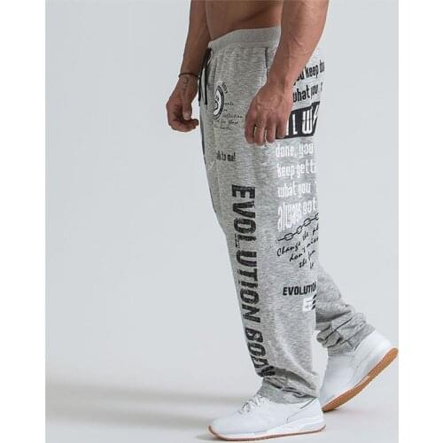 2021 European And American Solid Color Loose Large Size Printing Casual Fitness Trousers Mens Running Training Sports Pants