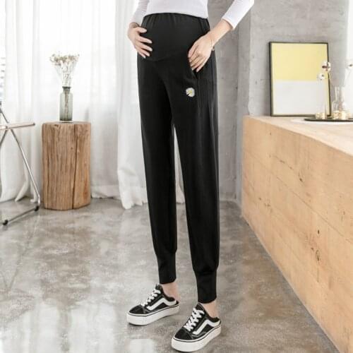 Pregnant womens casual pants autumn and winter chrysanthemum embroidery belly lift pants loose casual pregnant women pants