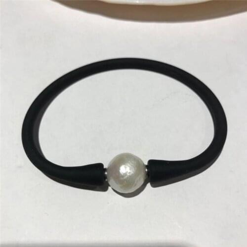 Natural white purple freshwater pearl with Nucleated Baroque size About 11-12MM Rubber bracelet 7.5"